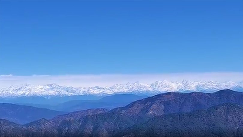 Panoramic viewpoint at Himalaya Darshan, offering majestic Himalayan vistas among the best places to visit in Nainital.