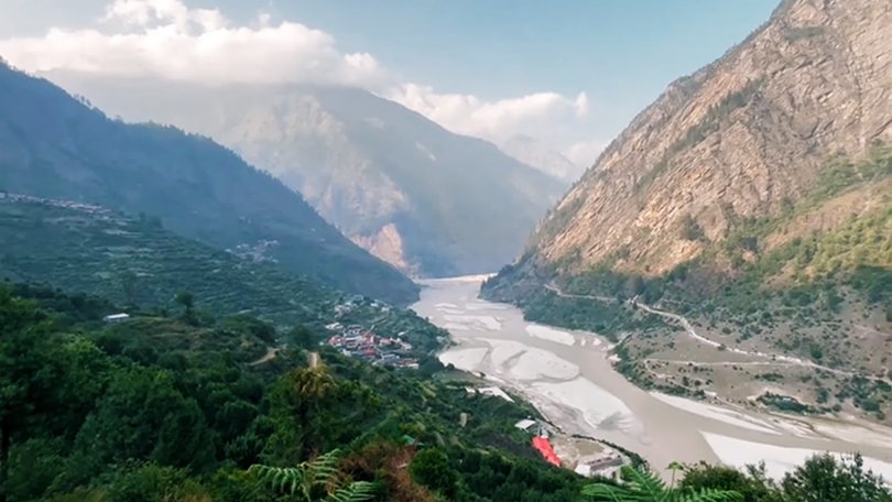 Harsil Valley scenic beauty on the way to Gangotri Dham Yatra 2026 with apple orchards and Himalayan views