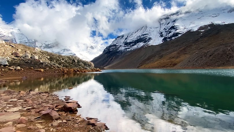 Kedar Tal high altitude glacial lake near Gangotri Dham Yatra 2026 with Himalayan peak reflections