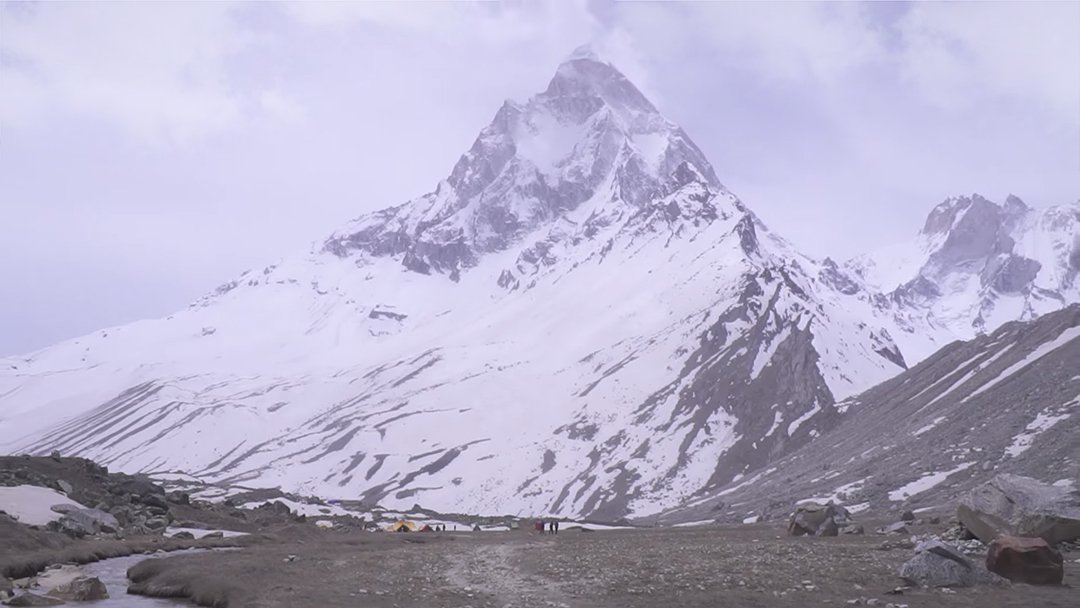 Trekking and camping at Tapovan meadow below majestic Mount Shivling, breathtaking Himalayan view featured in the Gaumukh Tapovan trek guide.