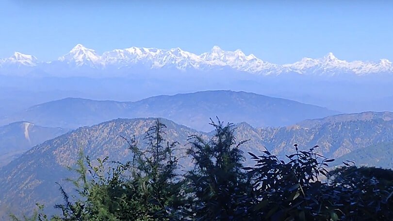 Snow View Point in Nainital with Himalayan peaks and forested hills